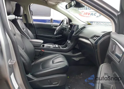 2022 Ford Edge Titanium z USA, uszkodzony, nr VIN 2FMPK4K96NBB05154